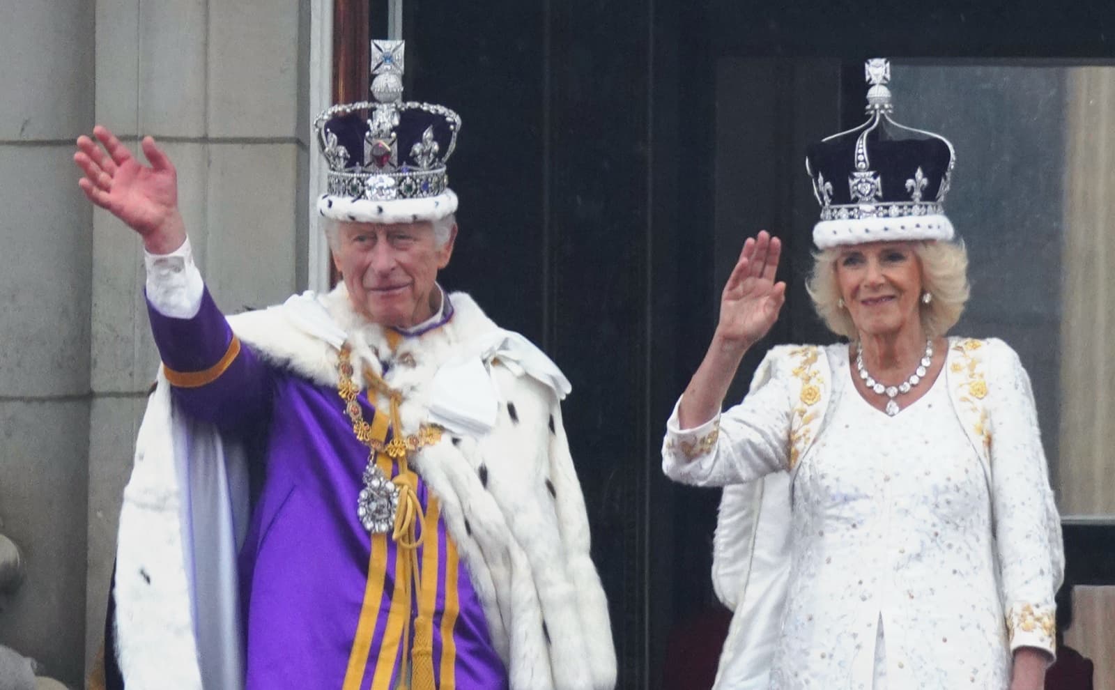 The royal family waving from the Buckingham Palace balcony during King Charles III's coronation, 6 May 2023