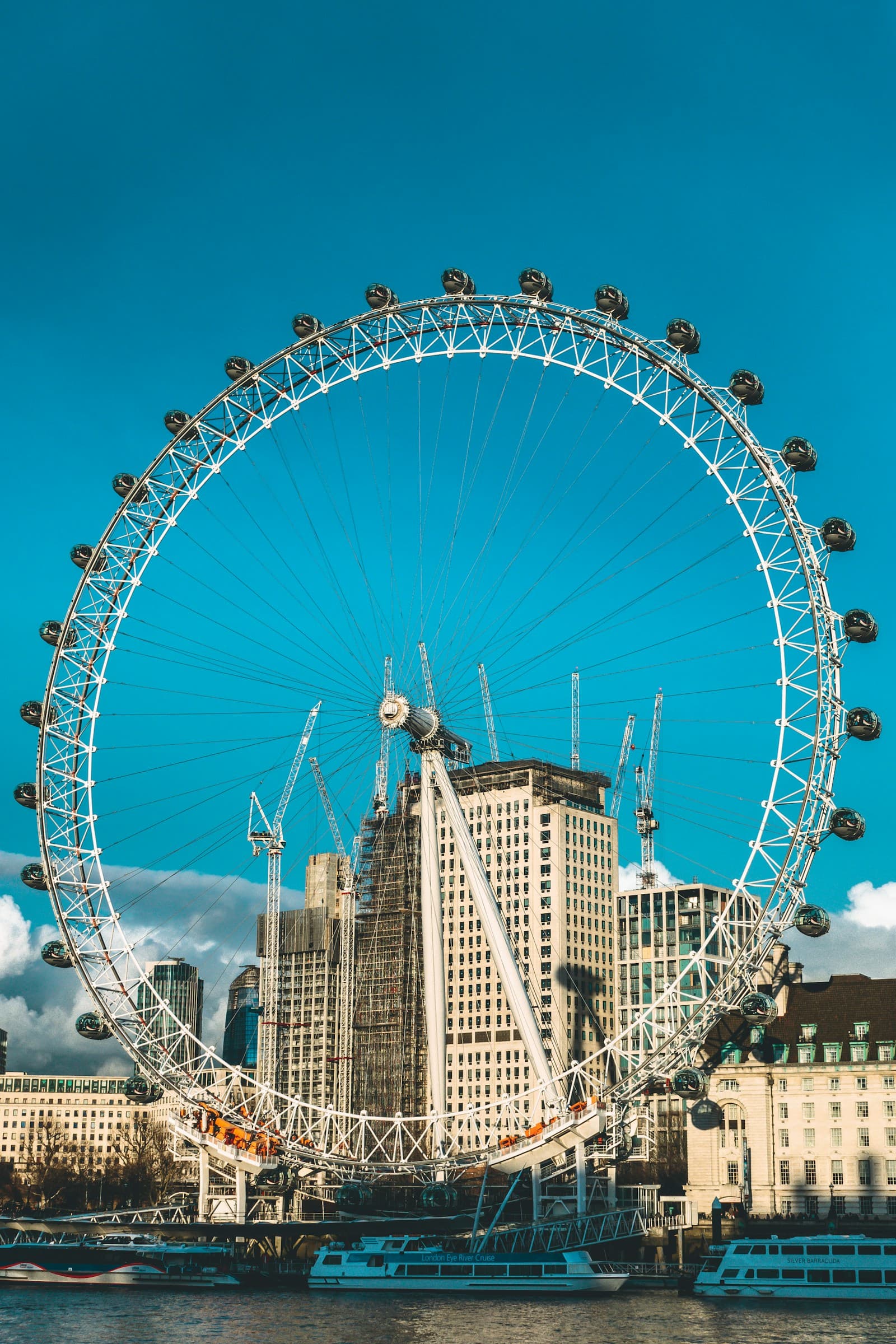 The London Eye Ferris wheel on the South Bank of the River Thames at night, used as part of New Year celebrations